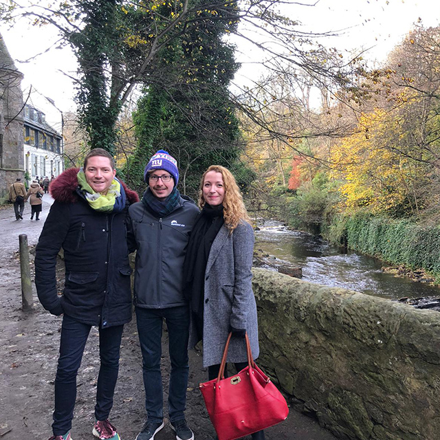 Photo of Eddie and his family in front of a river