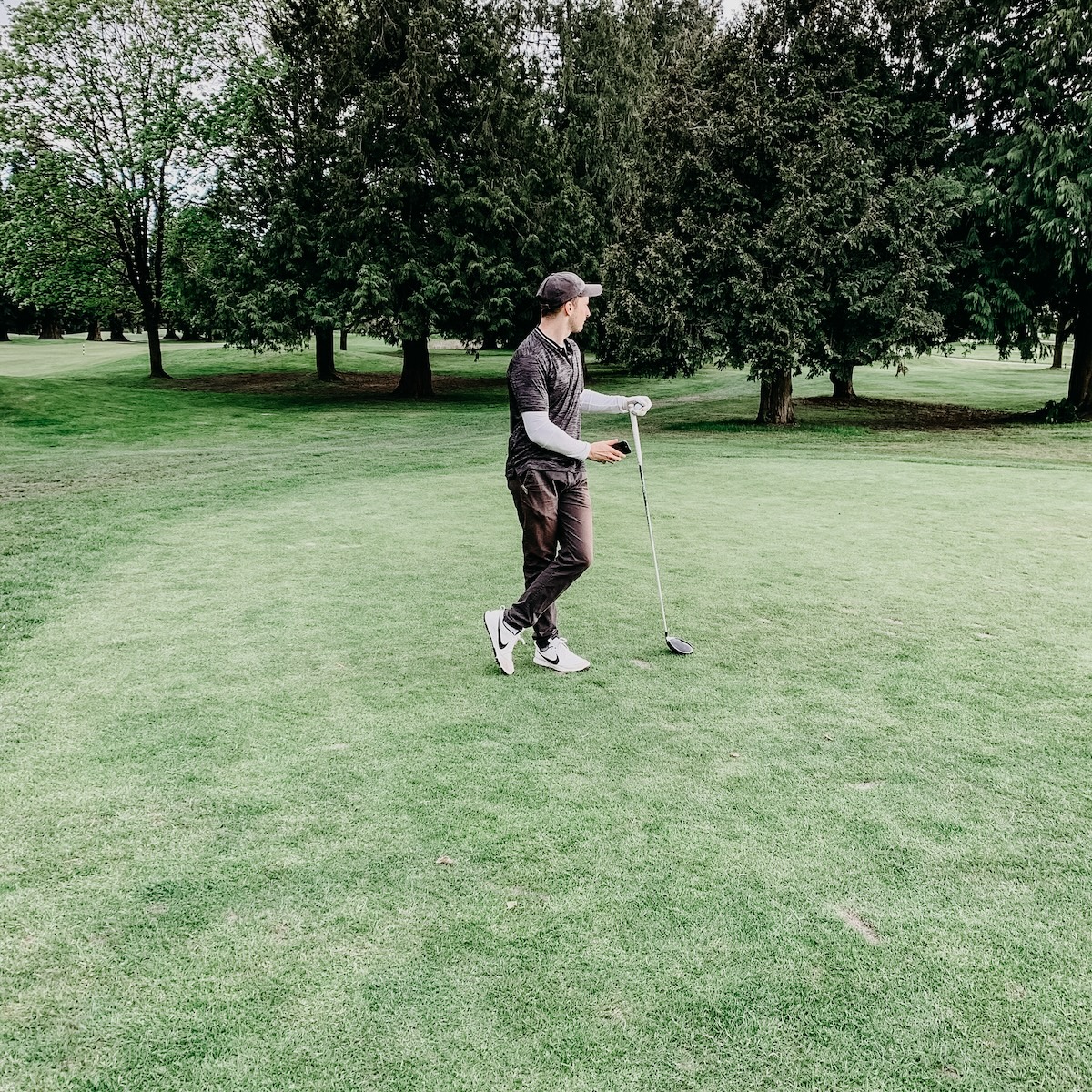 Photo of Mackenzie golfing